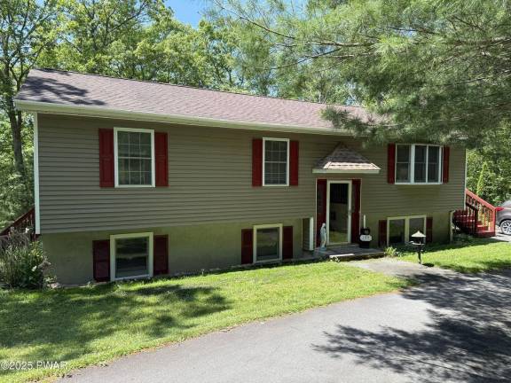 Bi-level home on a two-acre corner lot with low taxes Bi-level home on a two-acre corner lot with low taxes