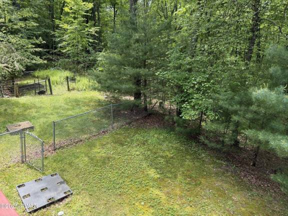 Bi-level home on a two-acre corner lot with low taxes Bi-level home on a two-acre corner lot with low taxes