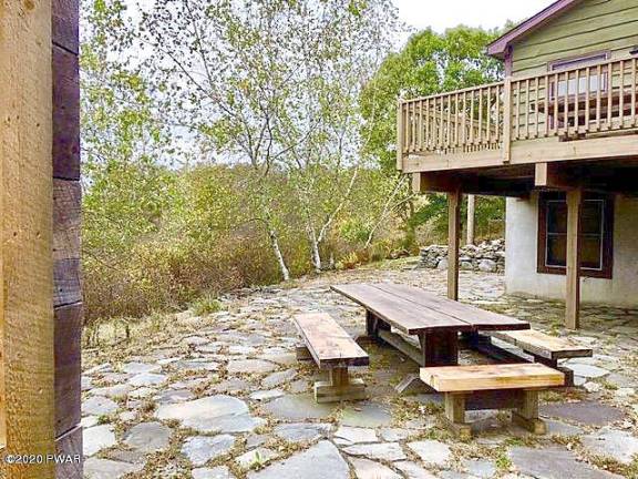 Custom three-bedroom on secluded, historic acre with lake rights Patio