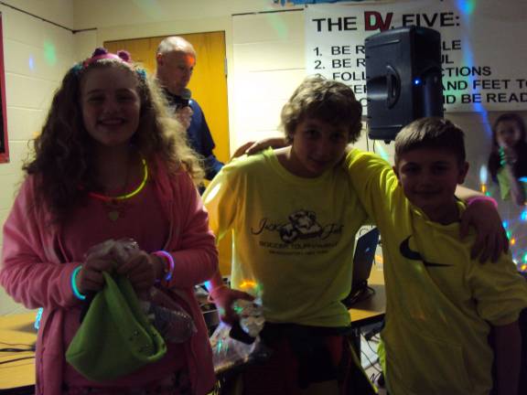Brightening up the season Photo provided The winners pictured from left: Sara Serrano, Nicholas Kaylani and Joseph Ropke.