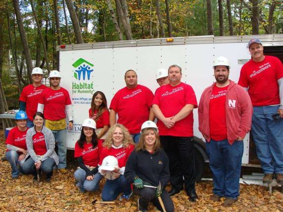 Barbecue and tricky tray to raise funds for Habitat for Humanity Wells Fargo Bank sent 13 volunteers for the day last November to work on House #23 in Sunrise Lakes, Milford. Wells Fargo Bank also donated $10,000 from its Community Development Program to cover some of the costs of building this home. (Facebook photo)
