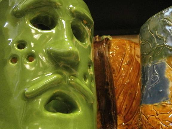 From a lump of clay come many stories Green face by Trevor Harvey