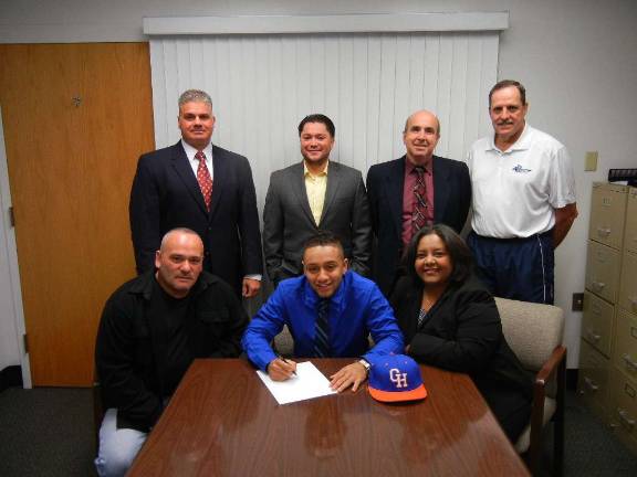 Rivera signs with Georgia Highlands Pictured from left: (front row ) Rene Rivera, senior baseball player Matt Rivera and Zaira Rivera. (Back row) DV head baseball coach Dave Peters, Associate head coach at Georgia Highlands Gil Suarez, Assistant coach at GH Tim Havas and DV athletic director Allen Holtzer.