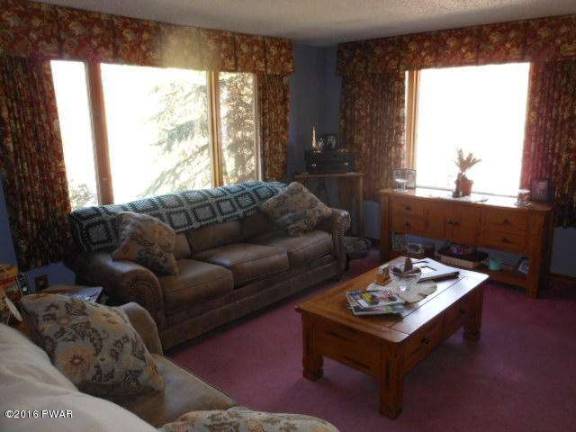 Secluded home has acreage, pool, stream, privacy Secluded home has acreage, pool, stream, privacy