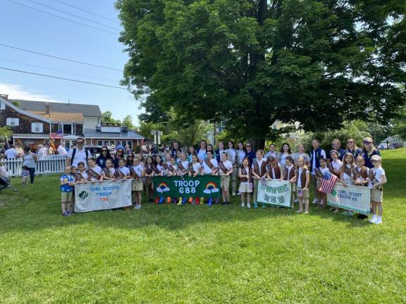 Volunteers are (mostly) hard to find Warwick Girl Scout Troops Memorial Day 2022. (Photo courtesy of Eileen Verboys)