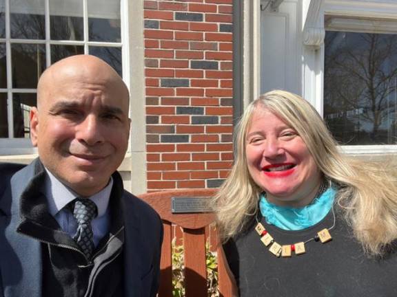 Hugh and Susie Siegel are shown at the bench dedicated to their mother Miriam Siegel on April 2.