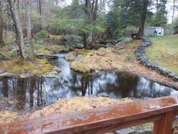 Country home with stream and lake view Country home with stream and lake view