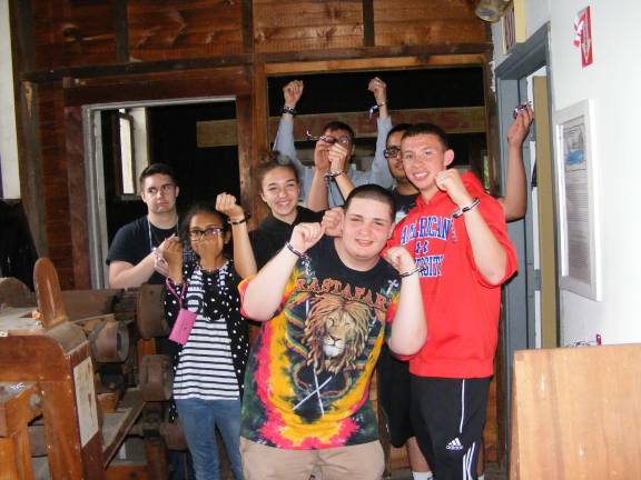 Channeling Frederick Douglass Students from Fallsburg, N.Y. -- Brendon, Stephanie, Daniel, Bijal, Sun,and Josh -- follow Frederick Douglass' exhortation to cast off the chains of discrimination (Photo by Linda Fields)