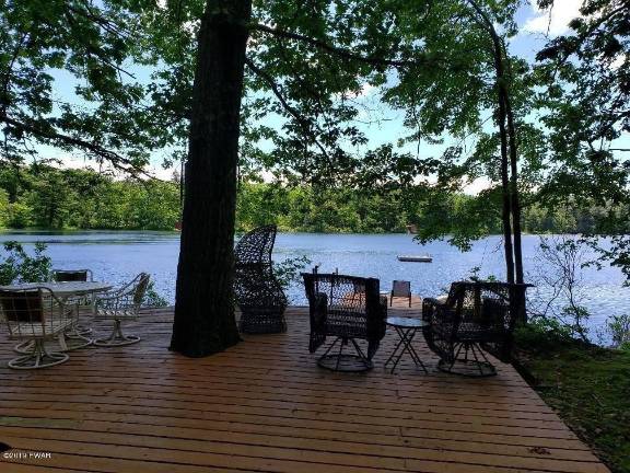 Four-bedroom lakefront contemporary is just steps from beach Deck