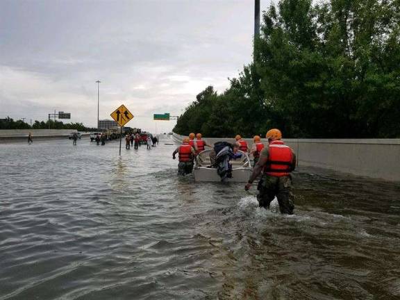 Donating to Harvey relief efforts: How, when, what to give Texas National Guard soldiers arrive in Houston to aid residents in heavily flooded areas from the storms of Hurricane Harvey on Aug. 27 (Photo: U.S. Department of Defense)