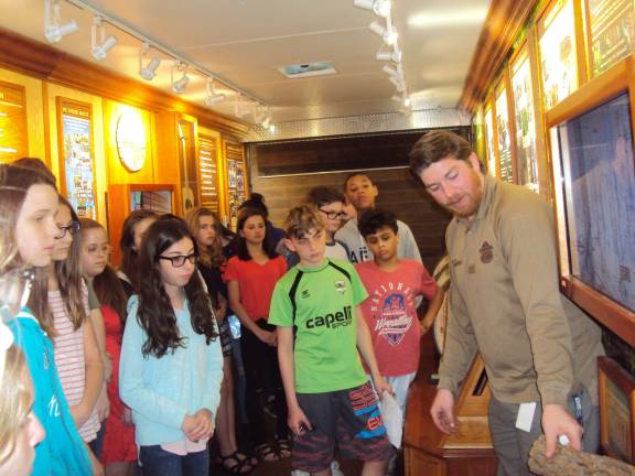 WoodMobile teaches students about the importance of forests Mrs. Favaro’s grade 7 Career and Leadership students listen to Matthew Boyd in the Pennsylvania WoodMobile during a recent visit (Photo by Sue Favaro)