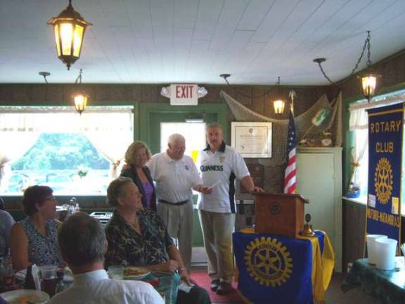Representing the Biondo Foundation (from left): Peg Schaffer, Rotarian Art Ridley and Milford-Matamoras Club President Tim Smith.