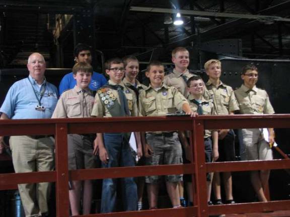 Scouts earn railroading merit badge Mr. Coxton, Museum Educational Counselor; Lucas Helms, Troop 77; Abhay Byadgi, Troop 76; John Babbitts, Troop 76; Gavin Brazanskas, Troop 76; Zane Papula, Troop 77; Jake Mills, Troop 76; Nick Azzolini, Troop 76; Daniel Bradley, Troop 77; and John Anthony Cirello, Troop 76.
