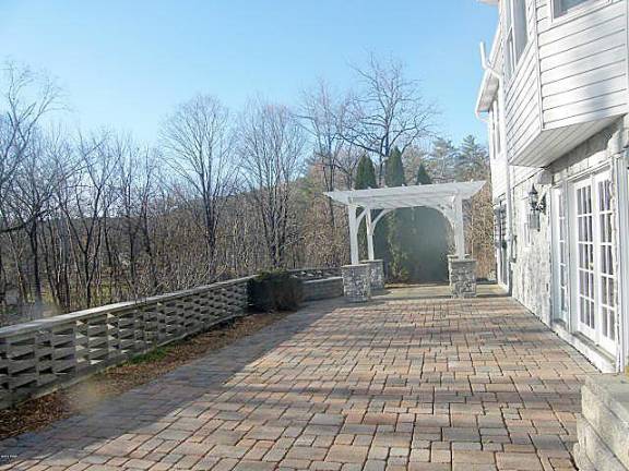 Five-bedroom colonial has luxury, charm, and lavish space Back patio