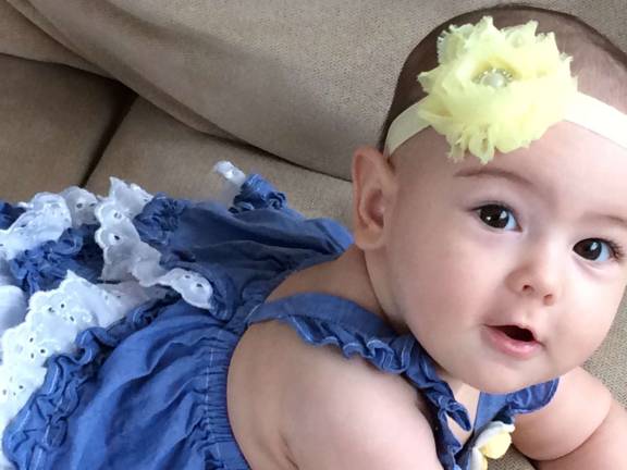 Oh Baby, it's Spring! Baby Photo Contest Photo, Judy New of Goshen "My granddaughter, Shirley Marie, smiling for the camera, again. She was 7 months old here."