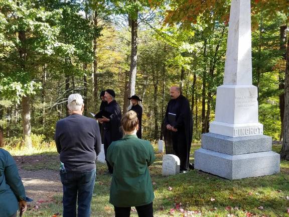 Readers in Laurel Hill Cemetery during last year's program.