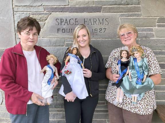 Lois Pellow of the New Jersey State Fair presents Caitlyn Space (center) and Lori Space Day (right) with limited edition Queen of the Fair Dolls (Photo provided)