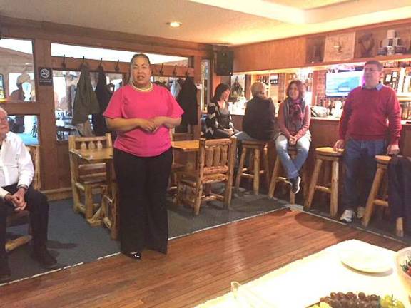 Christa Caceres addresses supporters at Failtes Irish Pub and Steakhouse in Dingmans Ferry last Sunday (Photo by Marilyn Rosenthal)