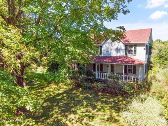 Historic “Sunnylands” Estate: Three Homes and a Boathouse on the Lake