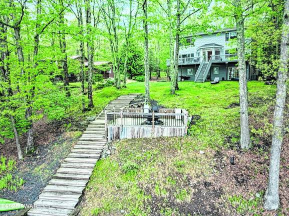 Lakefront views and a private dock await Lakefront views and a private dock await