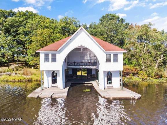 Historic “Sunnylands” Estate: Three Homes and a Boathouse on the Lake