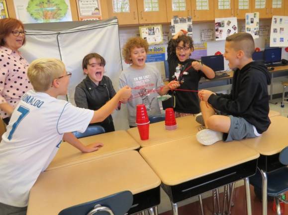 Teamwork makes the dream work at DVES From left: Ms. Atchison, Shane Kirk, Shannon O’Leary, Liam Orben-McDaniel, Winter Lily Oliver, Zachary Copertino