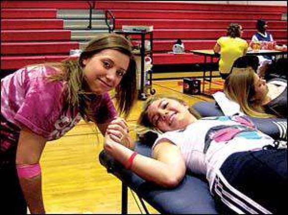 Students help neighbors and medical community Students help neighbors and medical community