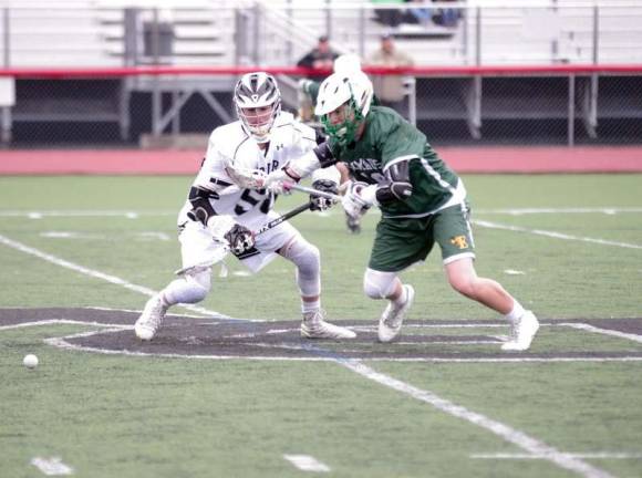 A weekend of DVHS lacrosse A Delaware Valley Warrior and an Emmous Hornet focus on the ball