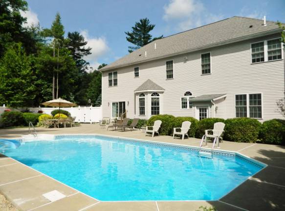 Modern, elegant four-bedroom home with privacy and a pool Pool