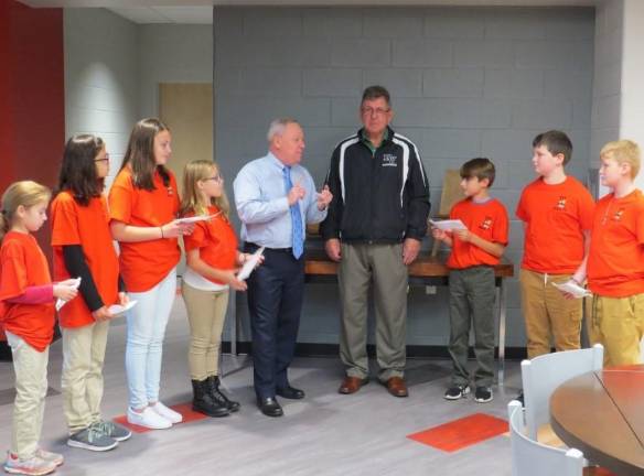 From left: Juliet Lee, Maggie Grant, Makaylee Kalitsnik, Kiera Mulzet, Dr. John Bell, Mr. Marvin Eversdyke, Cameron Stark, Drew Wallace, Logan Ey.