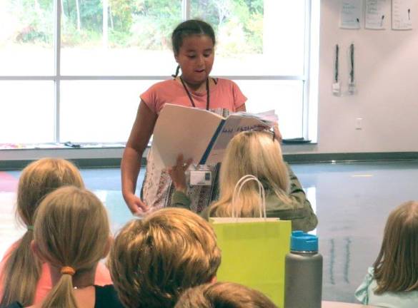Summer reading is a breeze Xiomara Rosario reads her journal.