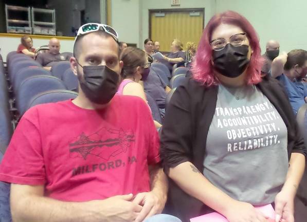 EK Guyre (right), a school board candidate, with and her husband, Justin (Photo by Frances Ruth Harris)