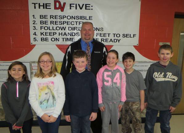 Top kids for January Fourth Grade Students of the Month: Alleigh Baker, Leah Haas, Jack Sullivan, Rylie Schuller, Alex Fitterer and Matthew Cosolaro with DVES Principal Aaron Weston. Not pictured: Leah Weinreb.