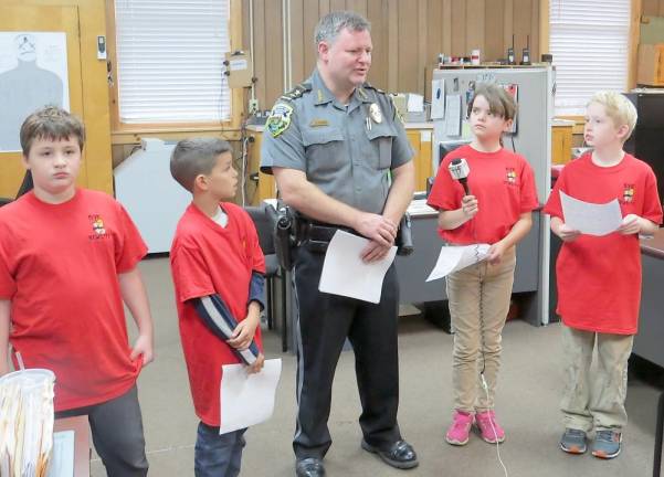 Don’t throw candy, don’t go through people's yards, and other great advice from the police chief From left: Sal Ciarelli, William Coleman, Chief Chad Stewart, Shannon O’Leary, and Taylor Allen