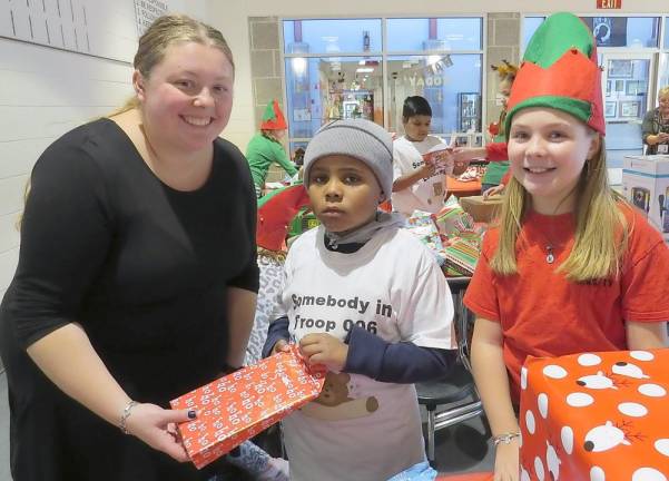 From left: Mrs. Caylyn Bush, AJ Brown, and Kiera Mulzet