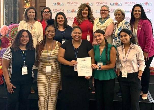 MANA named Chapter of the Year Top row (from left) Rosa Cavazos, Amy Hinojosa, Lorena Blanco-Silva, Martha Cardenas-Singh, Andreana Albott, Gabriela Hooshmand, and Maria Benitez. Bottom row: Aida Garcia-Cole, Oliana Cole, Olivia Cole, Celeste Yunez-Cosme and Kate Delgado.
