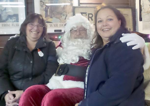 Wishes come true at 'An Old-Fashioned Milford Christmas' Bernice Williams, Chris Montemuro, and Santa
