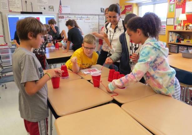 From left: Cameron Stark; Jamison Sybrandy; Mrs. Olsommer, DVES principal; Nathan Lara; Paris Machado