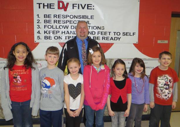 Top kids for January Third Grade Students of the Month: Amaya Lara, Kyle Czekaj, Gianna Zellmer, Cali Markwalter, Rhayna Simpson, Avary Hoffman and Aidan Papula with DVES Principal Aaron Weston. Not pictured: Devin Cavalone.
