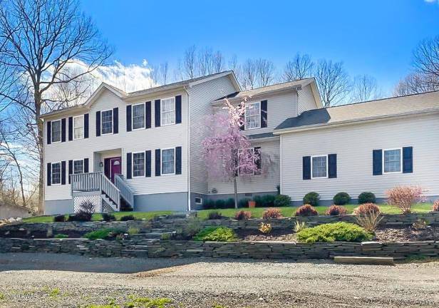 Modern colonial is roomy enough to work from home