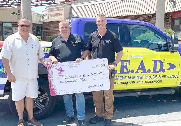 Delaware Valley School District L.E.A.D. program awarded $10,000 Grant L-R: Nick DeMauro, Robert Orr, and Chief Mark Moglia.