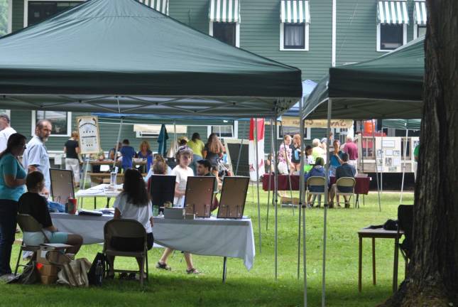 Booths on the lawn at a past Zane Grey Festival. (File photo by Anya Tikka)