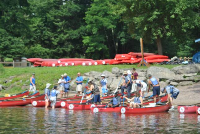 Keeping the Delaware River clean Launching from the Barryville base on Monday morning.