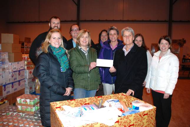 Hospital staff makes good on promise to food pantry From left: Julia Blaskiewicz, physical therapist; Kathleen Chicoski, Wayne County Food Pantry; Terri Henderson, occupational therapist/manager Wayne Memorial Rehabilitation Services; Heather Ceccarelli, speech therapist; Back row: Brandon Stone, physical therapist; Alyssa Young, Rehabilitation aide; Linda Moore, occupational therapist; Nancy Johannes, secretary; Karen Stump, occupational therapist. Missing: Anne Thumann, physical therapist; Tabitha Kanoff, occupational therapy assistant; Kim Hodder, physical therapist assistant; and Michelle Marcho, physical therapist assistant. (Photo provided)