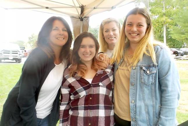 From left: Vicki McCabe, family support services; Kerri Kowalski, teacher; Julie Dabney, speech pathologist; Taylor Conklin, teacher (Photo by Frances Ruth Harris)