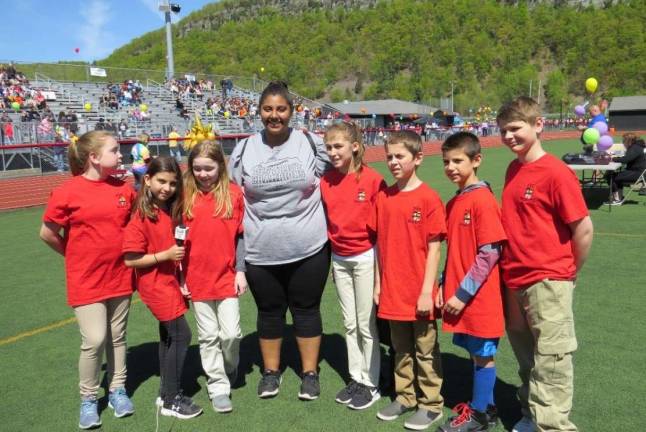 Special Olympics comes to DV We began our interviews with Dominque Cavallaro. She sang the National Anthem. She sings the anthem at basketball games and many other sporting events. She started singing at the age of three. Her favorite event at the Special Olympics is the running. From left: Mia Purdon, Scarlett Weir, Ryan O’Connor, Dominique Cavallaro, Adrianna Buchanan, Nixon Kameen, Ty Bates, and Jason King.