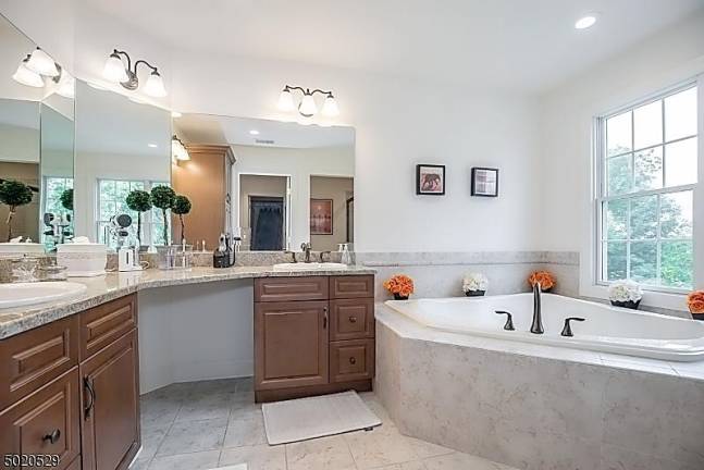 Enjoy mountain views from this light-filled colonial-style home Enjoy mountain views from this light-filled colonial-style home