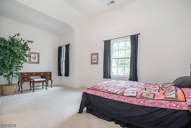 Enjoy mountain views from this light-filled colonial-style home Enjoy mountain views from this light-filled colonial-style home