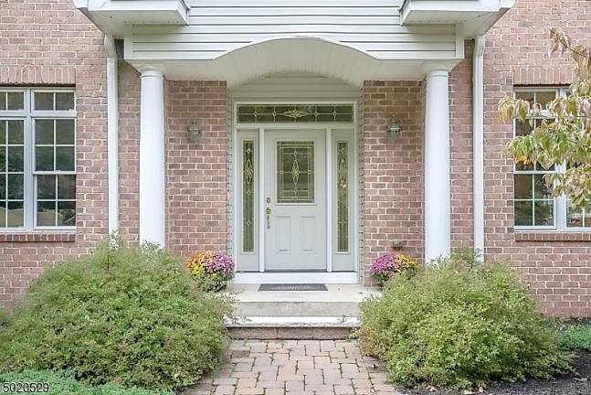 Enjoy mountain views from this light-filled colonial-style home Enjoy mountain views from this light-filled colonial-style home