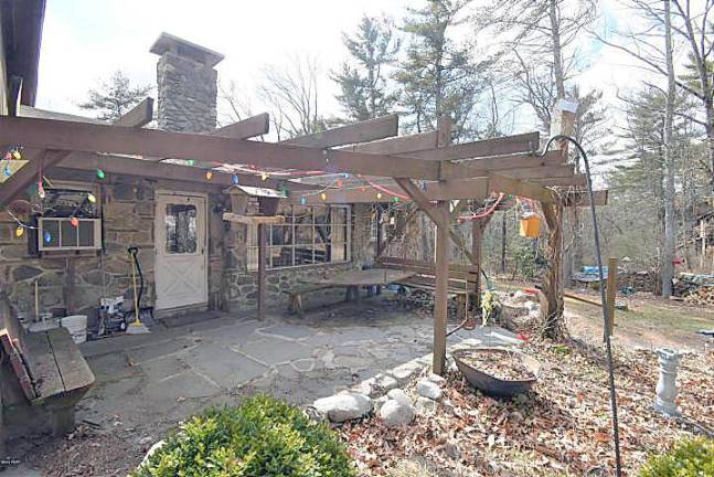 Estate home with artist studio, barn, and office building Patio